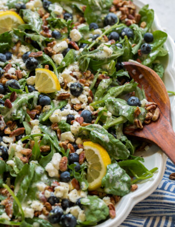 Blueberry salad with spinach, arugula, pecans, feta and lemon poppy seed dressing.