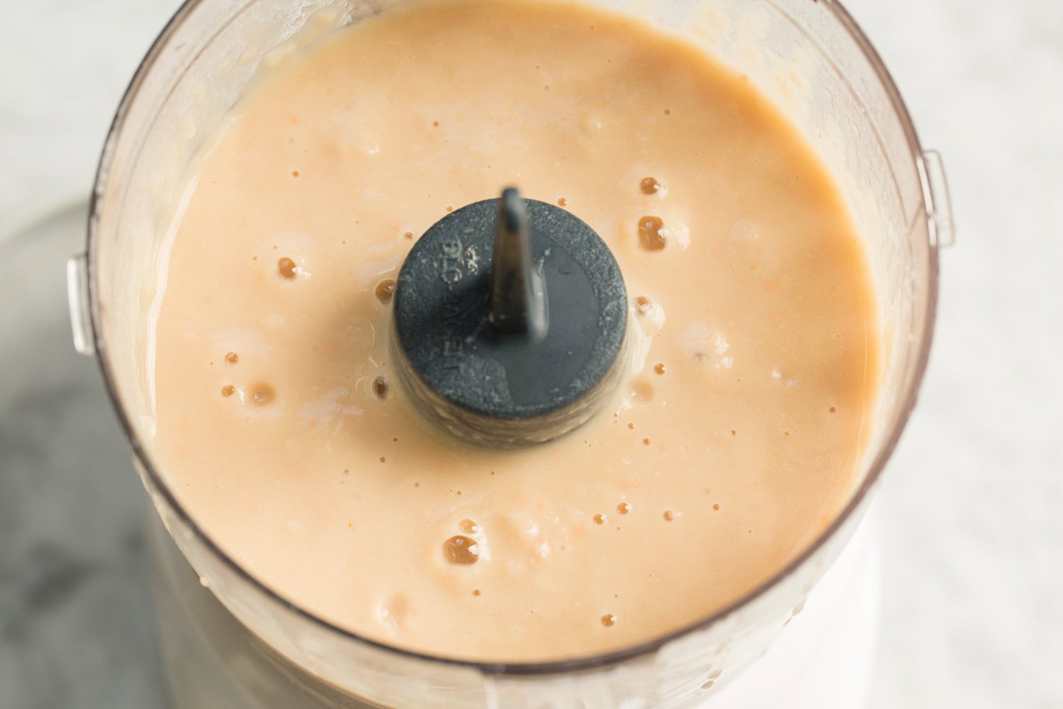 Beans in food processor after pureeing.