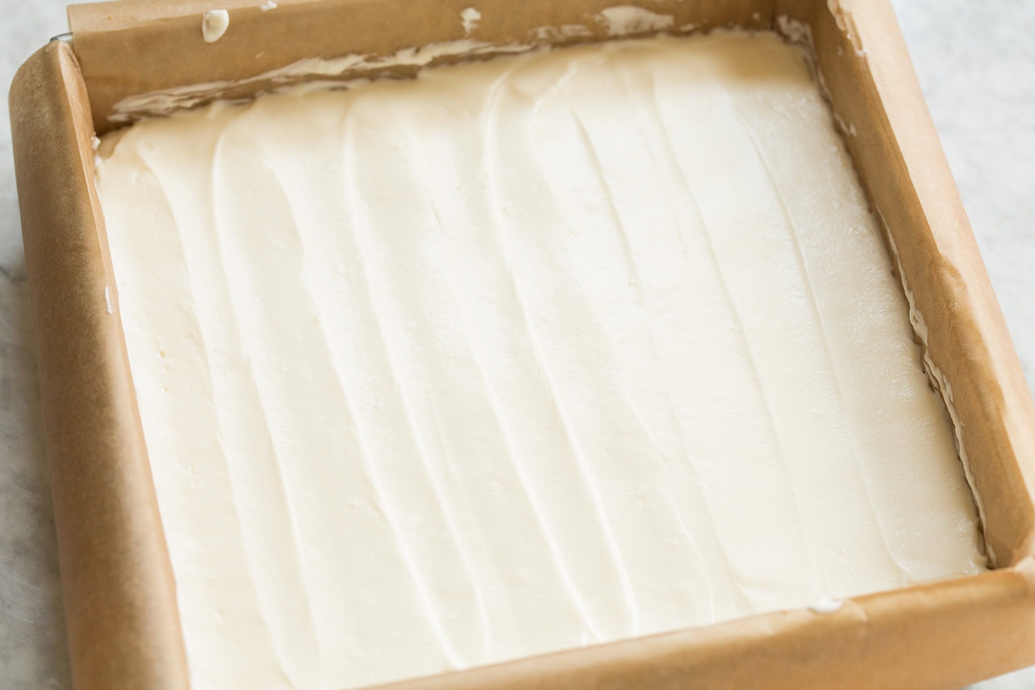 No Bake Cheesecake Cheesecake mixture after spreading over crust.