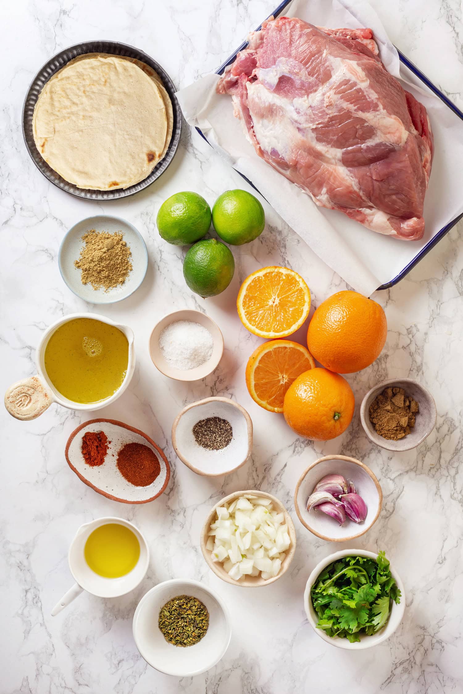 Ingredients used to make pork carnitas.
