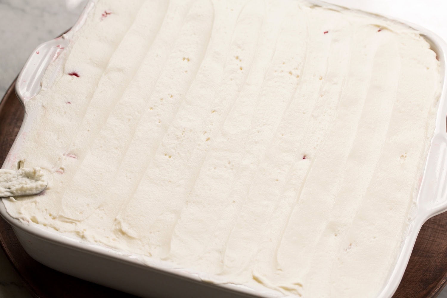 Cream cheese mixture layered over tiramisu.