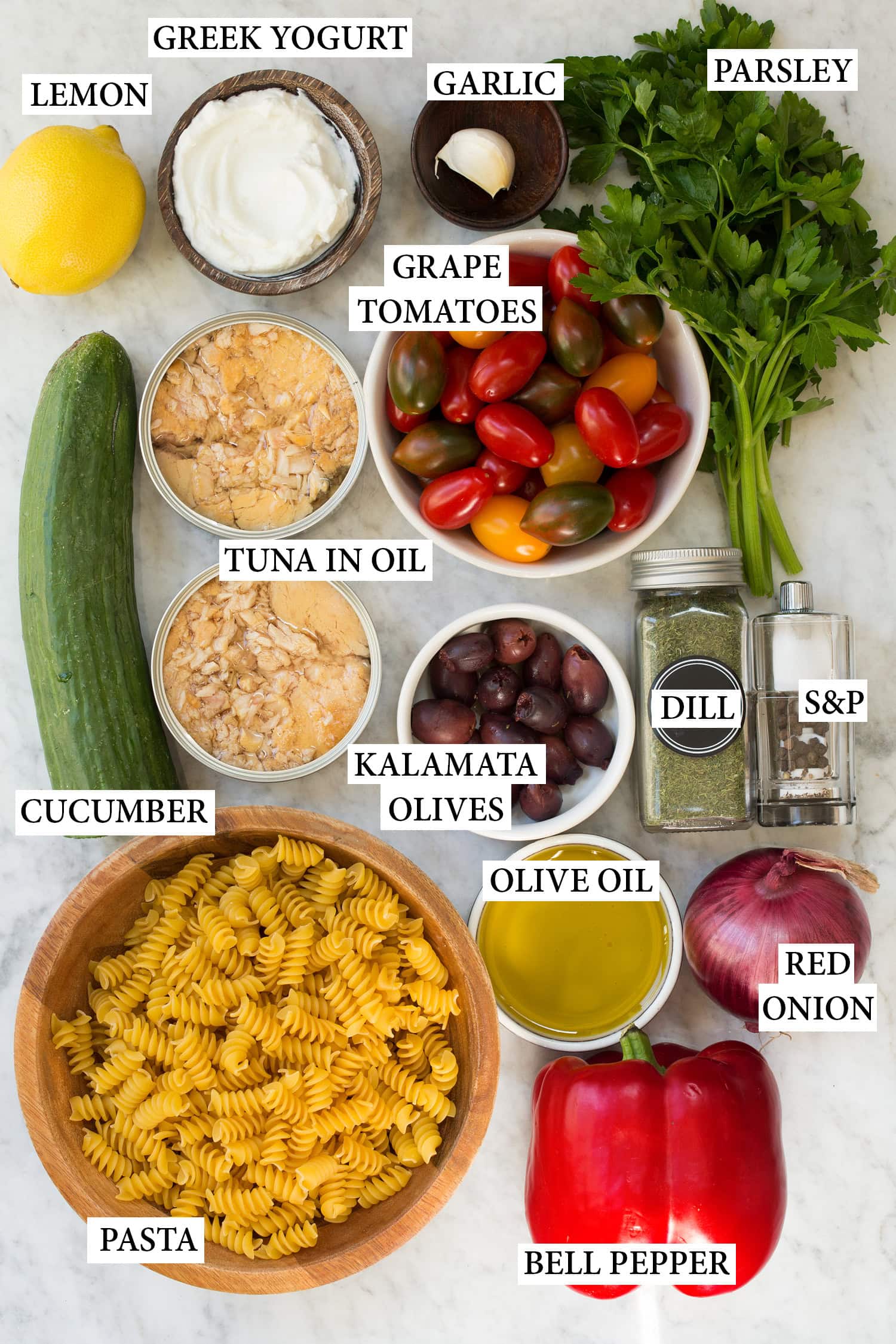 Ingredients needed to make tuna pasta salad.
