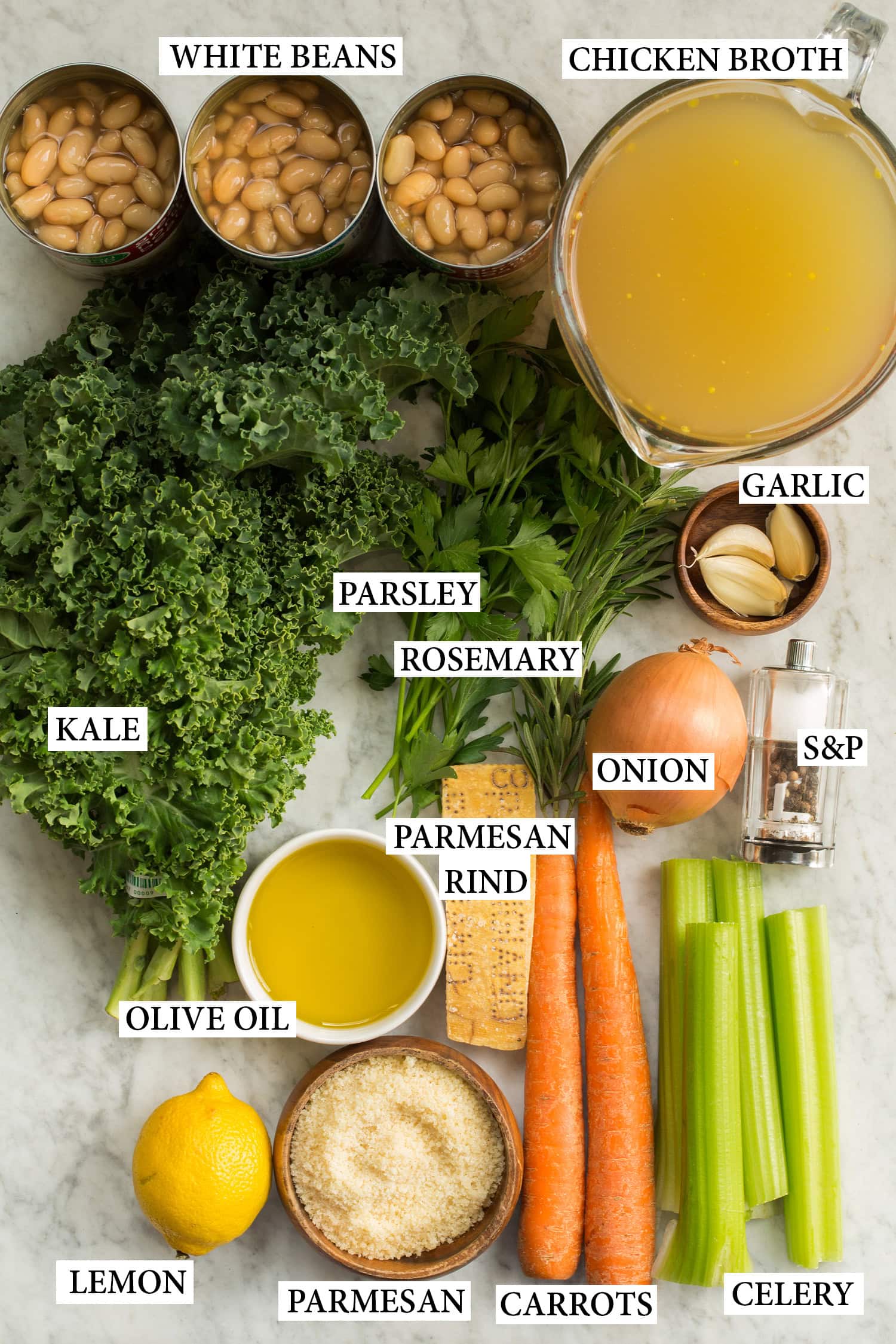 Ingredients needed to make white bean kale soup.